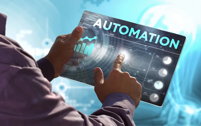Business, Technology, Internet and network concept. Young business man, working on the tablet of the future, select on the virtual display: Automation